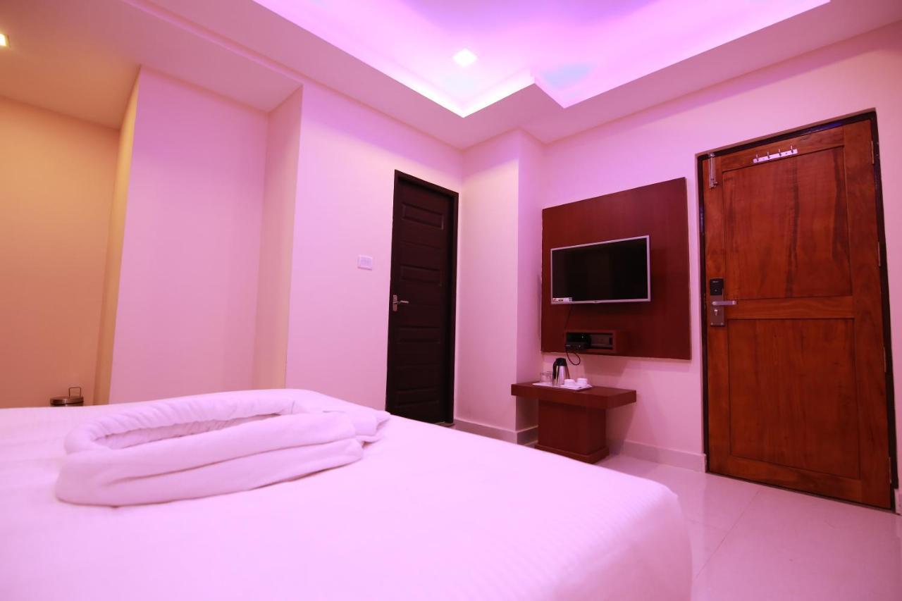 Hotel Apple Suites Bangalore Extérieur photo